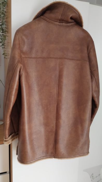 Piękny męski kożuch skórzany.