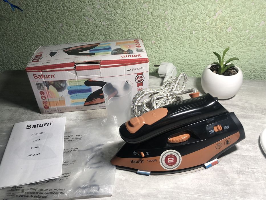 Дорожня праска Нова Saturn ST-CC0201: 800 грн. - Праски Горішні