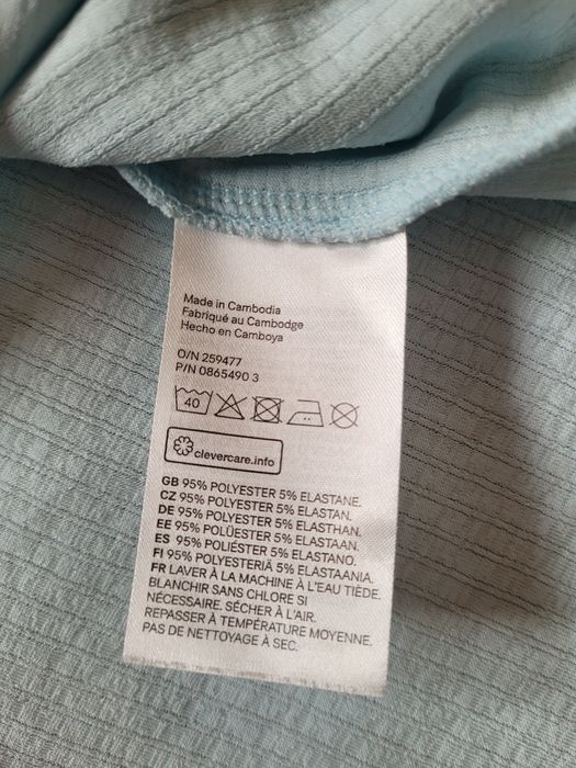 Błękitny niebieski prążkowany wiazany sweter bluzka 40 L