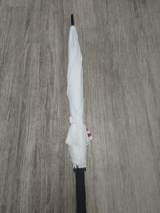 Sprzedam parasol długość 94 cm.