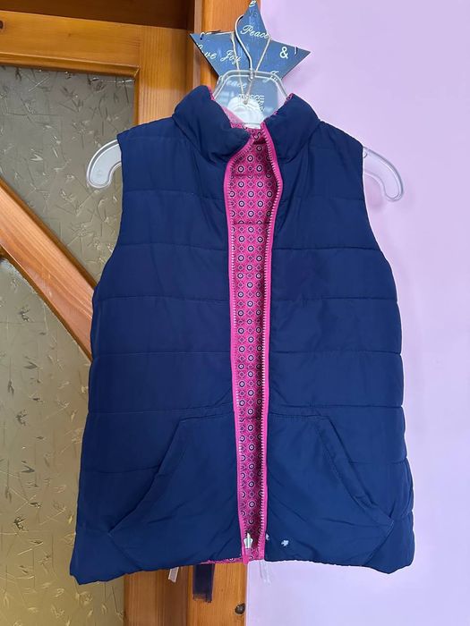 Безрукавка для дівчинки