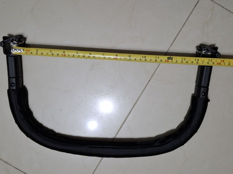 Uchwyt pałąk barierka belka wózka spacerówki dziecka