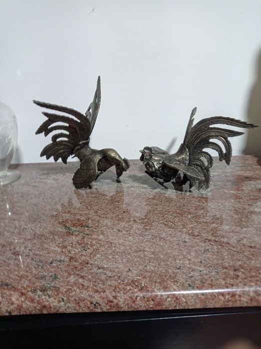 Galos de luta em metal