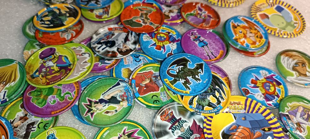 Lot of dozens of Yu-Gi-Oh! tazos from various collections64552625882113121