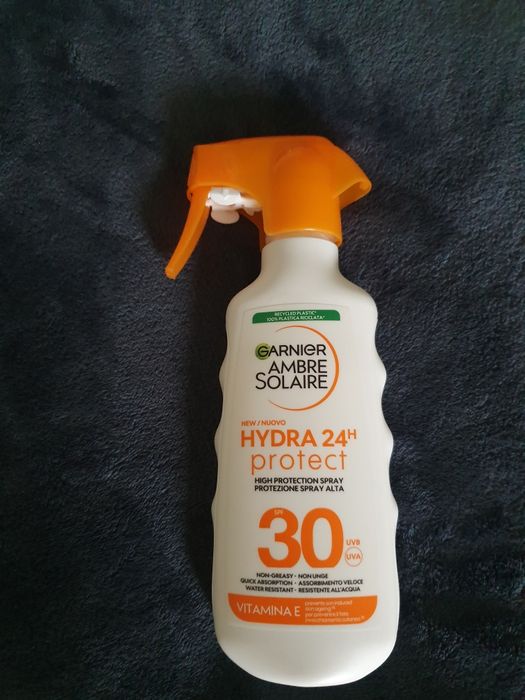 Сонцезахисний крем спрей