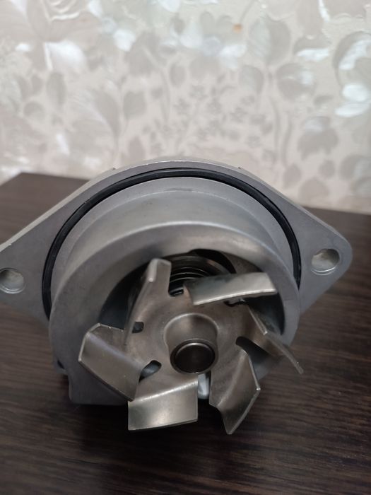 Помпа VAG / водяний насос VW Caddy 1.4