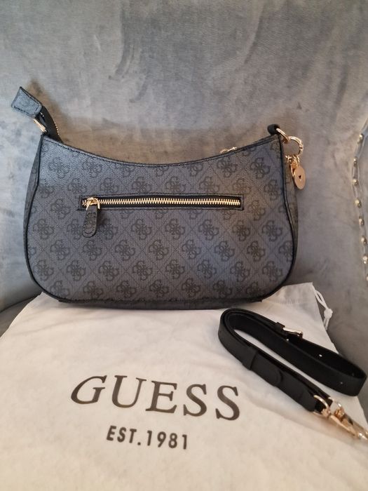 Mala da guess preta e dourada