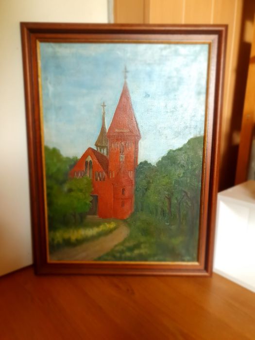 Obraz kościoła w ozdobnej ramie