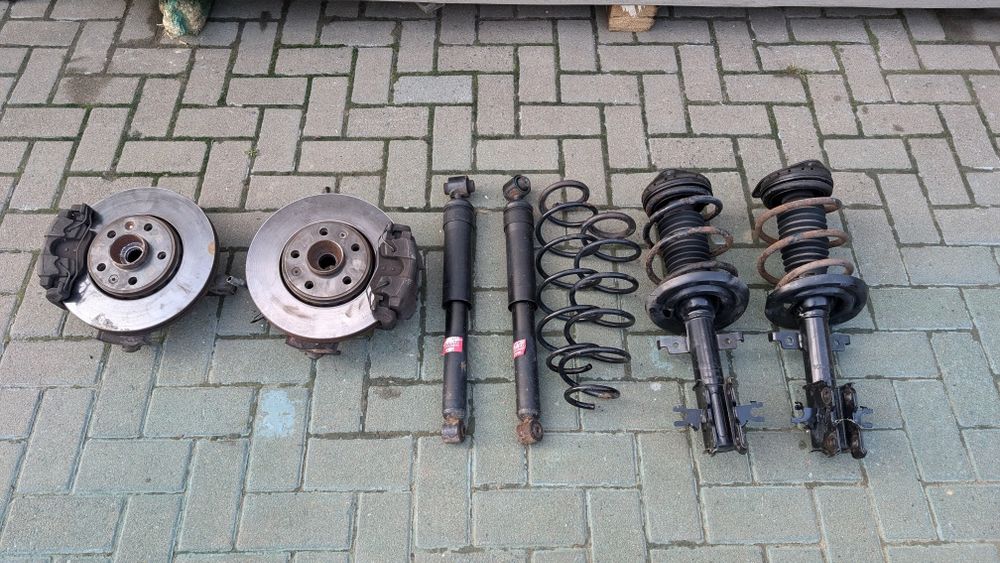 Стойки , диски renault laguna 3