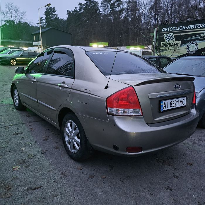 Kia cerato  2.0 автомат  газ-бензин