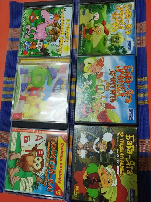 Обучающие игры песни для детей на CD.
