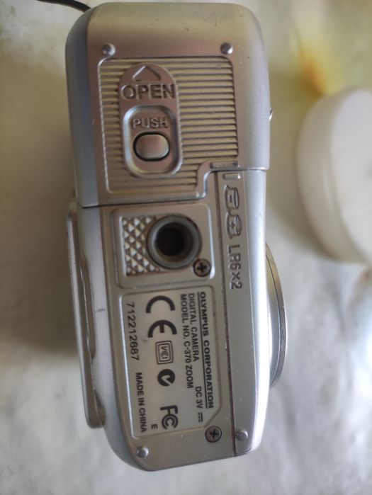 Olimpus Фотоопарати