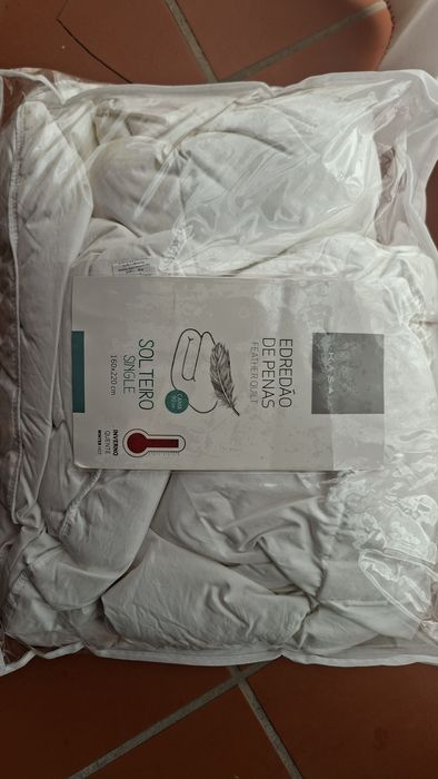Endredon de penas cama solteiro.