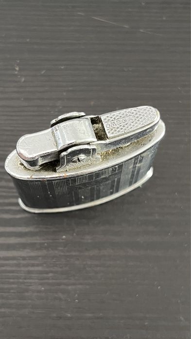 Isqueiro Omega antigo