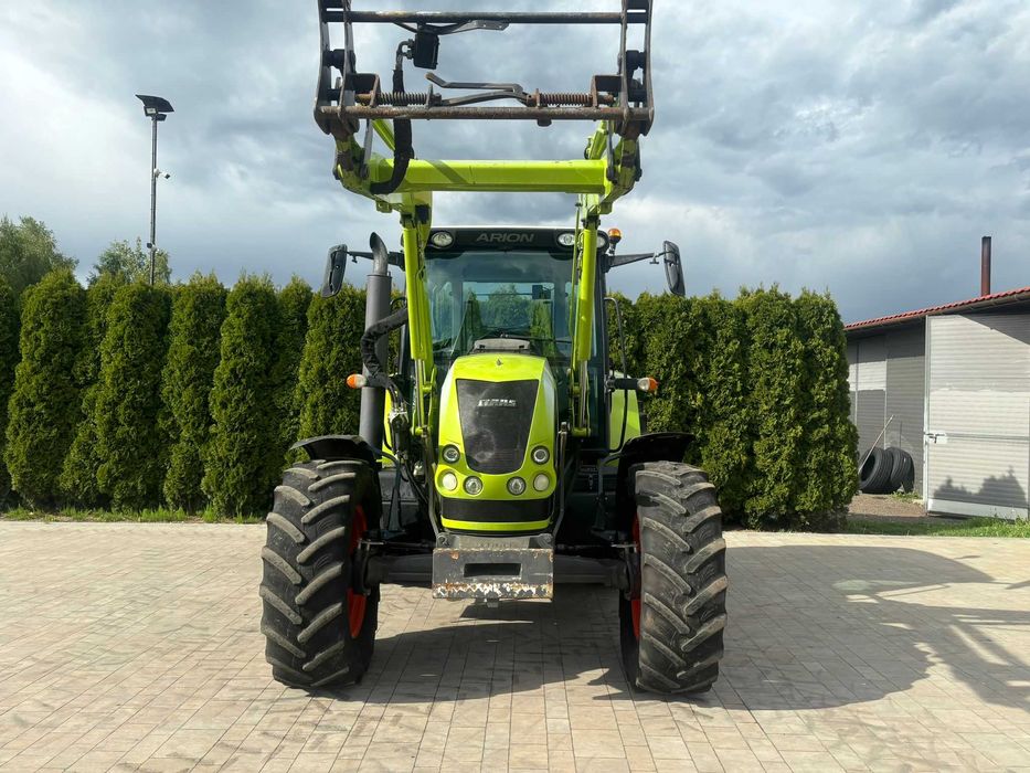 Claas Arion 510 z ładowaczem