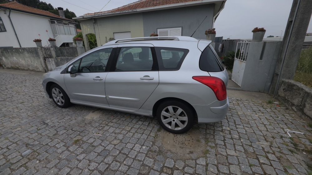 Peugeot 308 SW 1.6 HDi (2010) – Teto Panorâmico