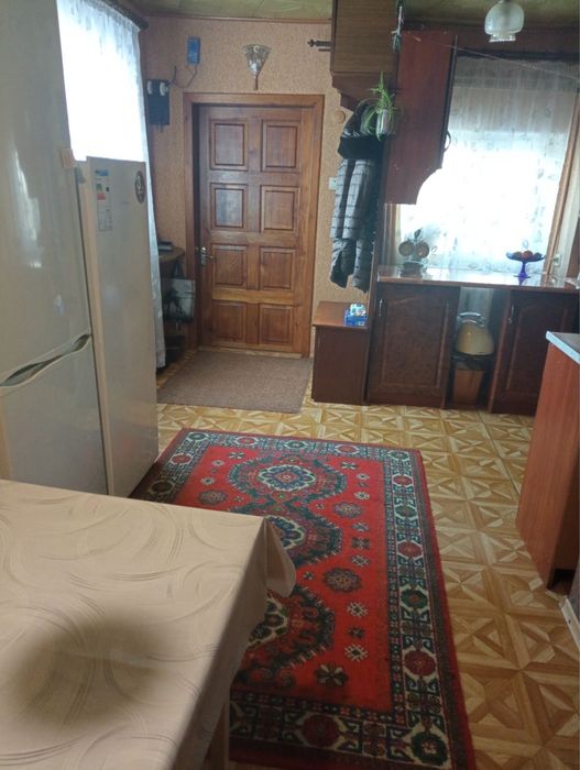 Продам часину будинка в центрі Зміїва
