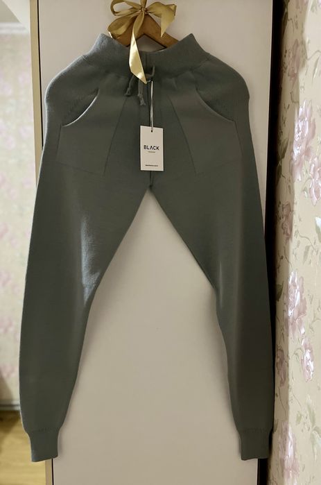 Стильний сірий  універсальний костюм від турецького виробника.