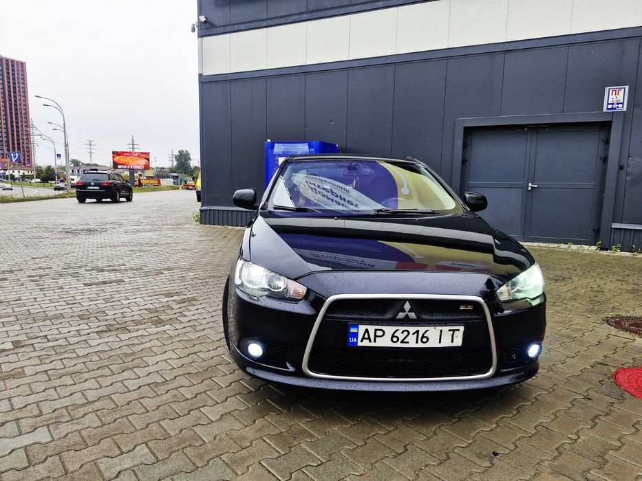 Митсубиши Лансер Х