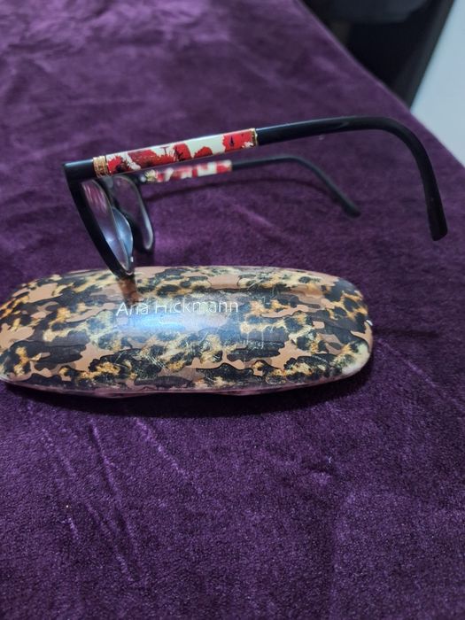 Armação Ana Hickmann, com haste dupla reversível (floral/preta)