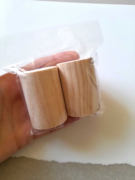 Peças de madeira cilíndricas para pintar