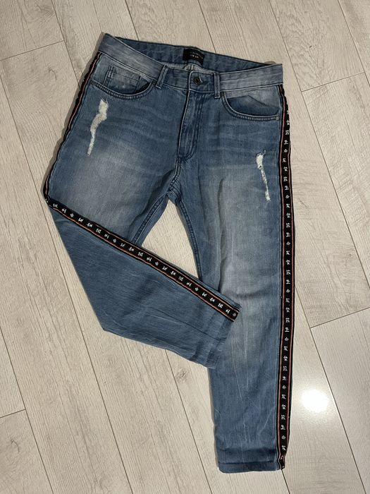 Spodnie meskie Reserved 32 z lampasem