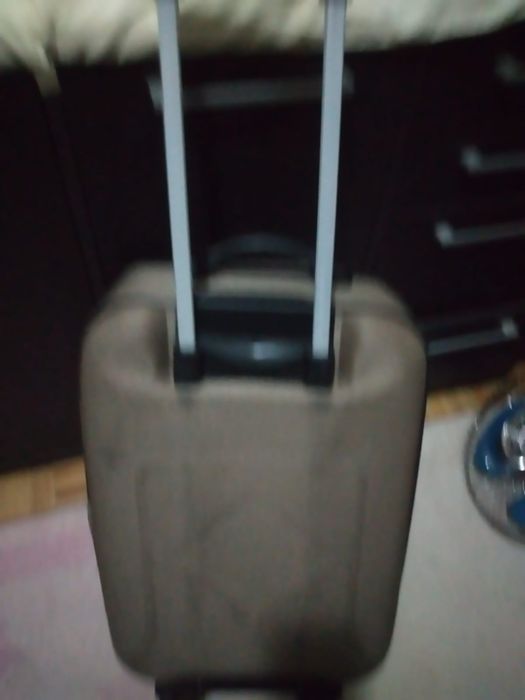 Mala de viagem tom cinza