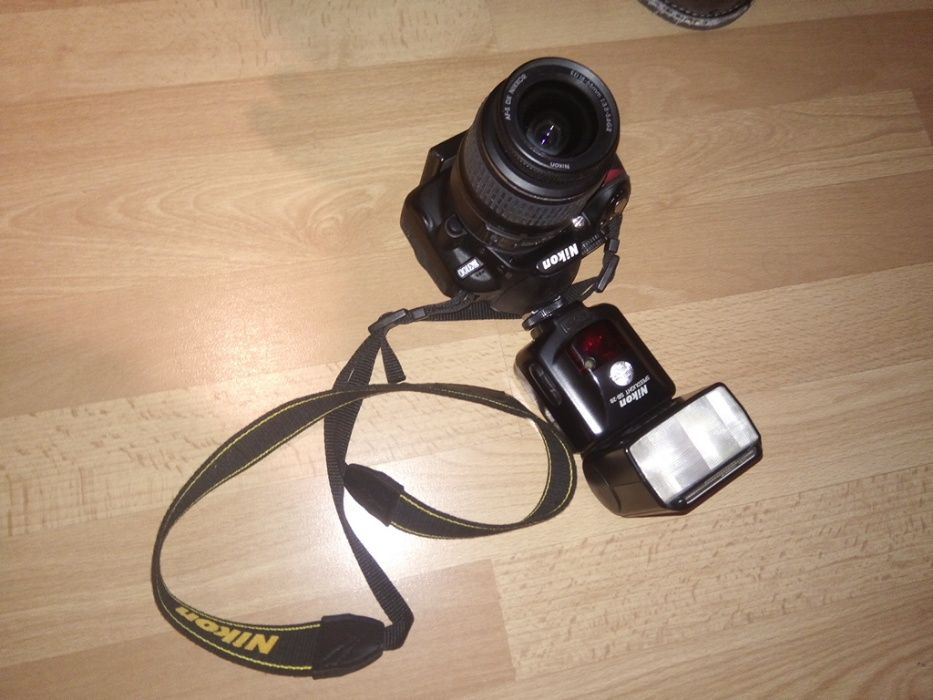 Nikon D3100 com zoom é flash