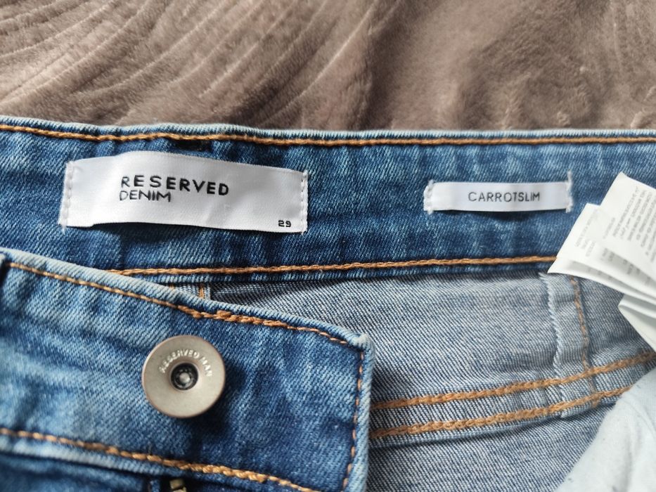 Jeansy męskie Reserved