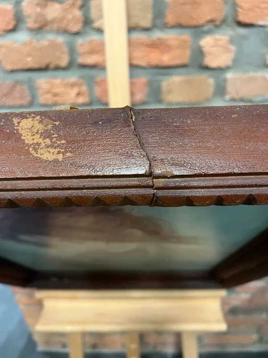 Obraz kobieta ruda w ramie brązowej pękniętej