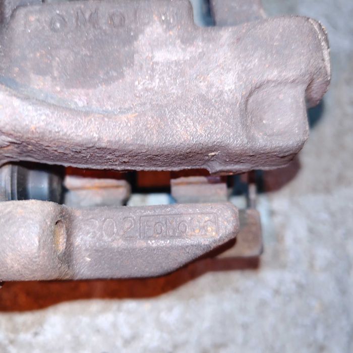 Zacisk hamulcowy elektryczny prawy, lewy tył Ford Mondeo MK5, Kuga