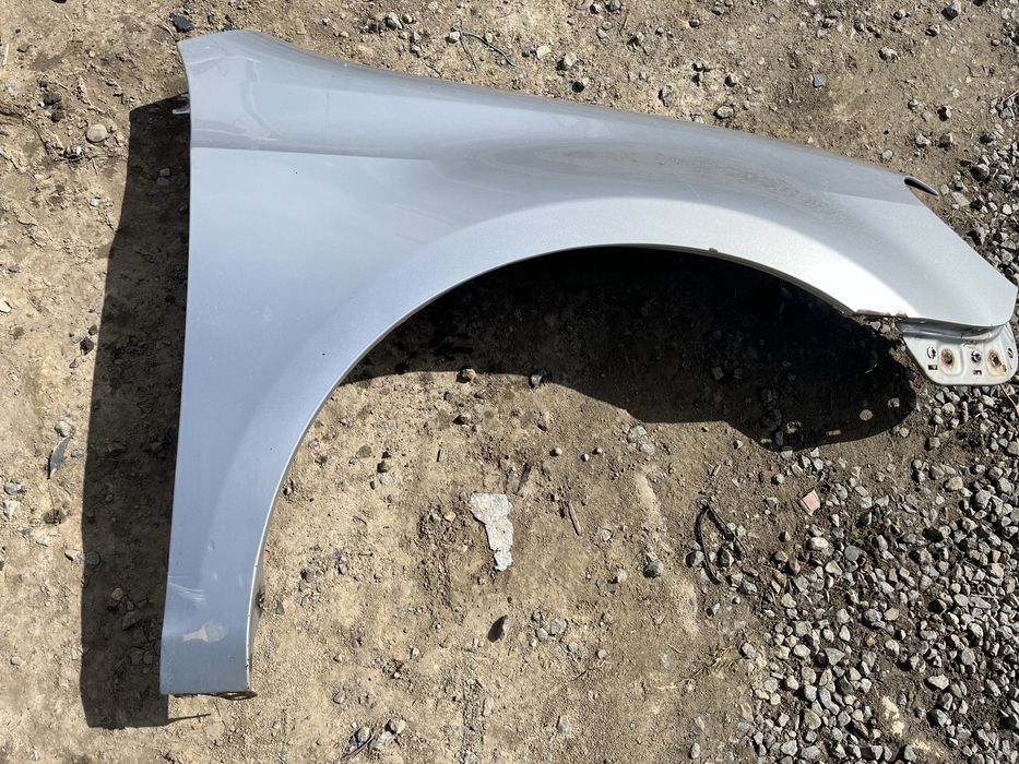 Blotnik przod prawy przedni vw golf 6 srebrny