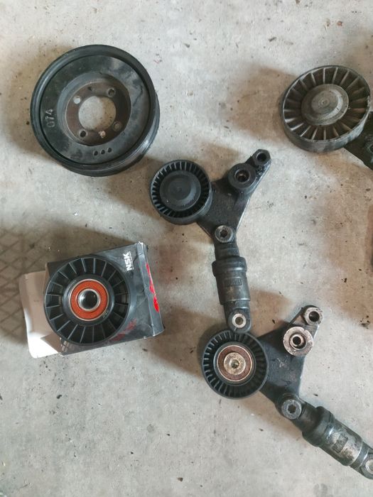 Натяжний механізм з роликом ремня генератора ОПЕЛЬ 2.0, 2.2 dti