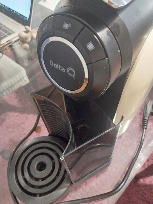 Maquina de café Delta Q com necessidade de arranjo