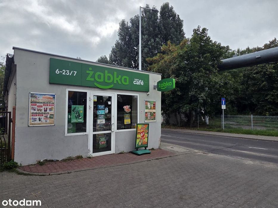 Dom z piwnicą  i 5 garaży  w Poznaniu oraz Żabka
