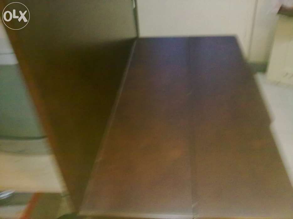 Mesa de mogno de duas faces