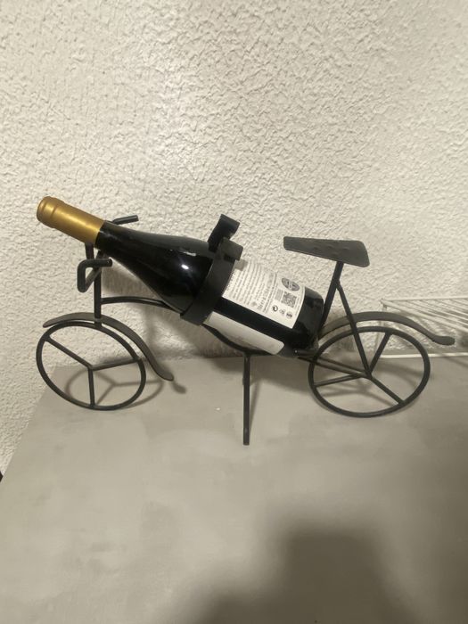 Suporte para garrafa em formato bicicleta