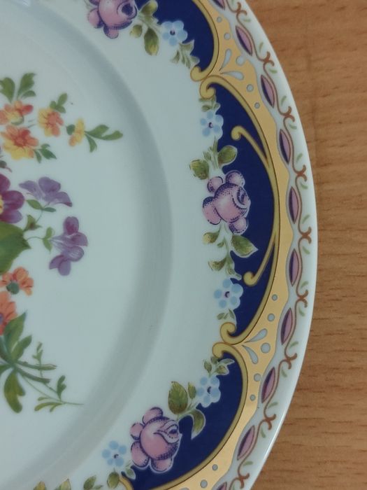 Conjunto de pratos em porcelana "Limoges".