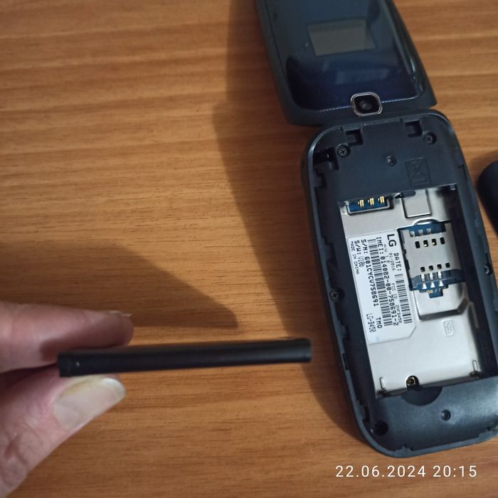 Мобільний телефон - разкладушка LG 450