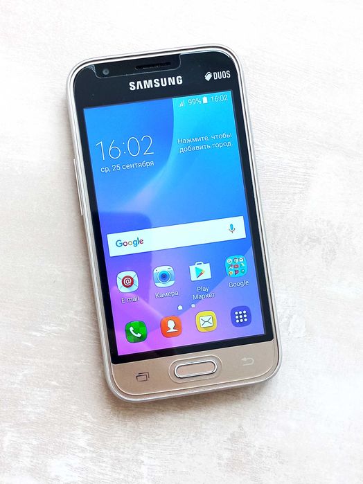 Мобільний телефон Samsung Galaxy J1 Mini Gold Duos смартфон золотий