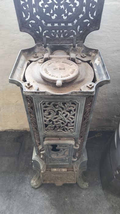 Stary emaliowany piecyk kominek koza