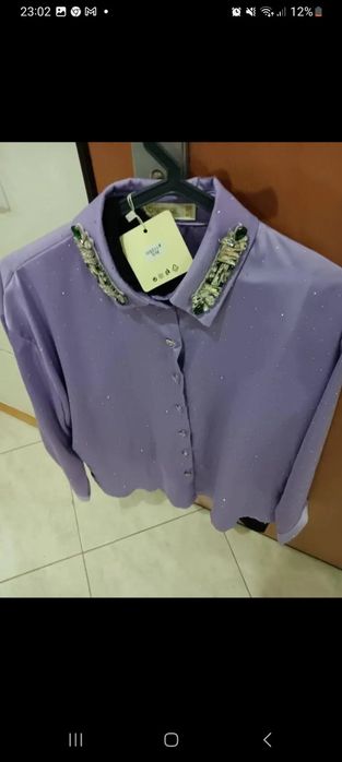 Conjunto de blusa e   saia  de calção