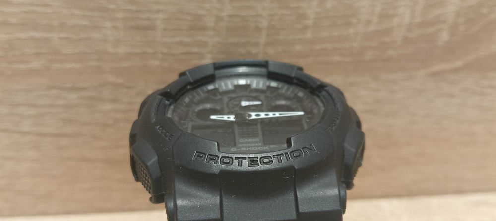 Zegarek Casio G-Shock GA-100 stan powystawowy! Okazja! Komplet gwarancja!