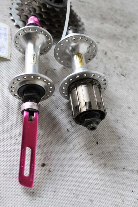 BUDŻET PIASTy rowerowe 7s 100/135mm 36H + kaseta hyperglide DB2