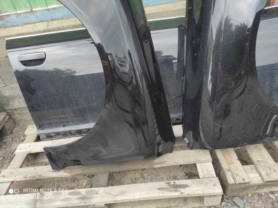 Audi A6 C6 lift błotnik prawy lewy LZ9Y