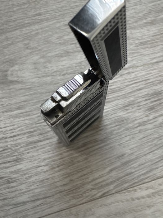 зажигалка с фирменым щелчком