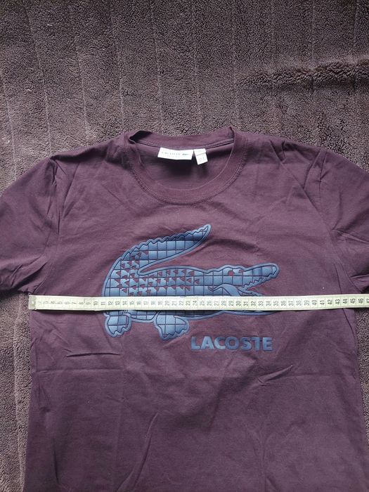 Футболка фірми lacoste оригінал 

Размер: S/ M

Заміри детальні:

Довж