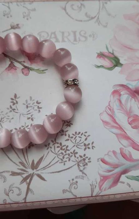 Różowa bransoletka z serduszkiem i cyroniami coquette