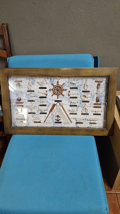 Vendo quadro alusivo a objetos marítimos