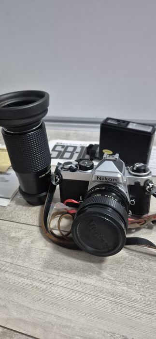 Nikon FE+ 2 obiektywy + lampa SB-10 + dokumenty (1981)